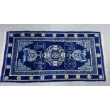 Chinese style small carpet commissioned by Ma Hushan (1910 - 1954) circa 1930, the blue ground