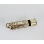 An early 20th century white metal engraved whistle with a vacant shield cartouche, 7cm long