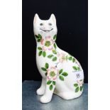 A Griselda Hill pottery Wemyss ware cat painted with flowers, 18cm high