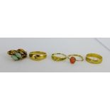 A collection of four 9 carat gold rings and a 14 carat gold ring (5)