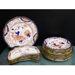 A Royal Crown Derby 'Imari' pattern 3019 dinner set to include nine dinner plates, six bowls, six