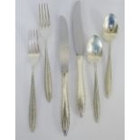 A suite of American Wallace Sterling flatware comprising six table forks, six table knives, six