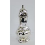 George VI silver sugar castor of octagonal baluster form with pierced top and stepped finial, with