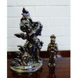 A lustre cupid fireside stand and a small Knight figure, (2)