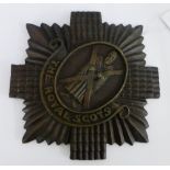 A cast iron Royal Scots plaque, 25cm wide