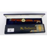 Lady's Burberry's wristwatch, the circular dial with Burberry check pattern and Roman numerals, on a