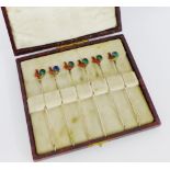 Set of six early 20th century silver and enamel 'cockerel' cocktail sticks, in fitted case