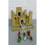 A toy castle together with a collection of knight figures etc., (a lot)