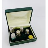 A collection of silver thimbles to include three by Charles Horner, one Birmingham silver and one
