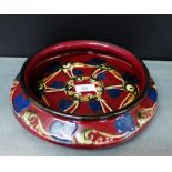 Danico Danish Art Nouveau pottery flat bottomed bowl with scrolling leaf pattern, with impressed