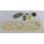 A long strand of pearls together with a silver brooch and a paste set clip etc ( a lot)
