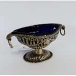 Victorian silver Adam style salt with blue glass liner, having ring handles and pierced classical