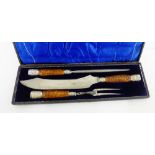 A three piece horn handled carving set, in fitted case