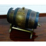 A brass and iron bound barrel with brass tap, complete with stand