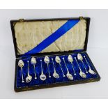 A cased set of twelve continental silver teaspoons, stamped 830