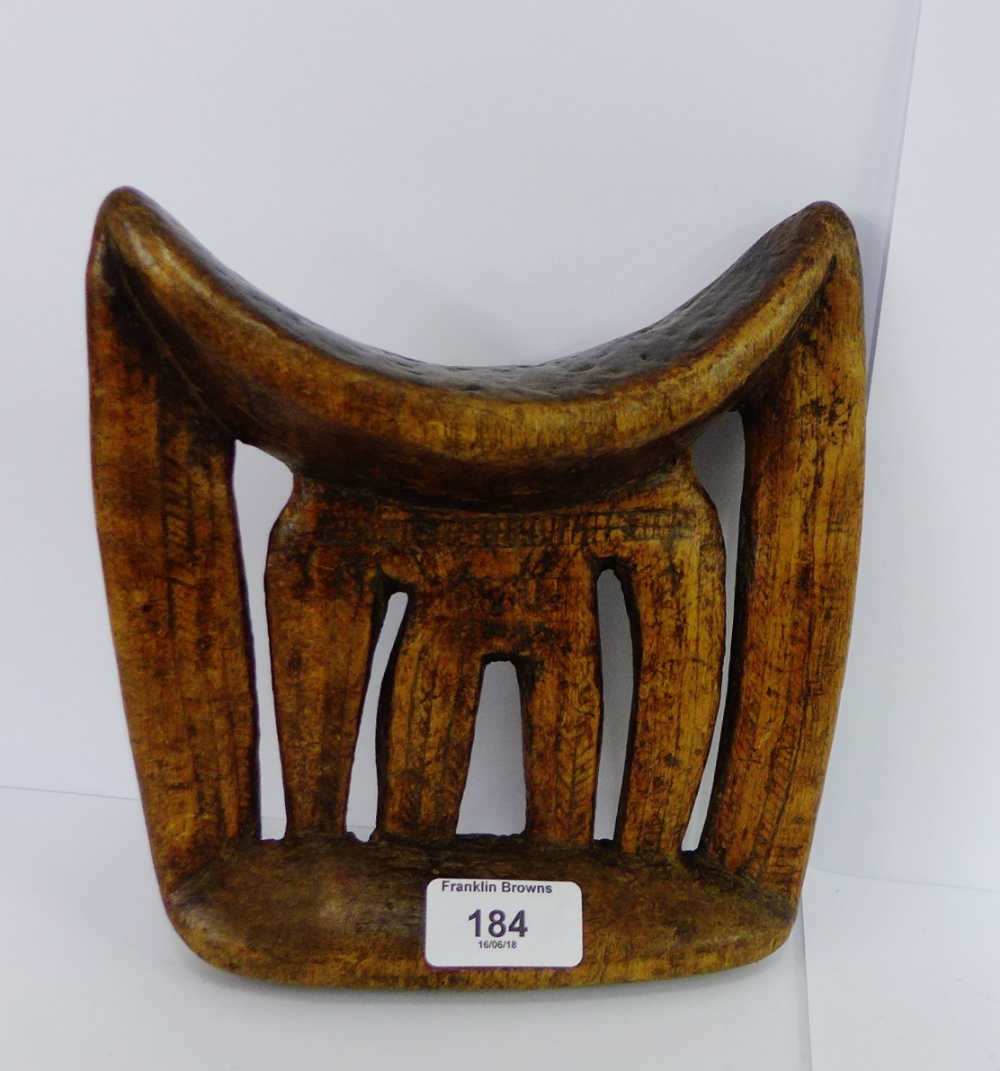An African hardwood headrest, 20cm high