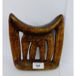 An African hardwood headrest, 20cm high