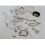 A mixed lot of silver and costume jewellery to include rings, bangles and necklaces etc (a lot)