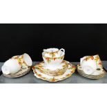 Bell china porcelain teaset painted with Autumn flowers comprising six cups, six saucers, six side