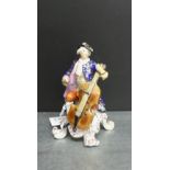 Derby figure, 'The Cello Player' (a/f) with red backstamps, 15cm high