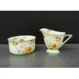 Royal Doulton 'Poppy' patterned milk jug and sugar bowl, (2)