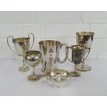 A collection of five silver plated trophy cups and an Epns quaich (6)