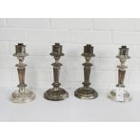 A pair of Sheffield plate knop stemmed candlesticks with star pierced sconces together with a