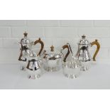 20th century five piece silver teaset comprising a bullet shaped teapot, 18th century style coffee