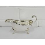 Elkington & Co silver sauce boat on three hoof feet, Birmingham 1939, 17cm long