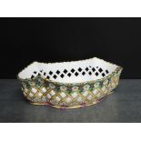 Minton's oval porcelain basket with reticulated sides and daisy pattern border, with printed