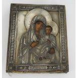 19th century Russian Icon with silver oclad depicting Madonna and Child, velvet covered back, 11.5 x