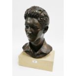 Lucy Poett (Scottish School) bronze head and shoulders sculpture of a boy on a rectangular stoneware