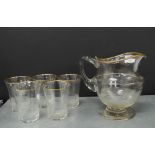 19th century cut glass water set with gilt edged rims comprising jug and set of five beakers, (6)