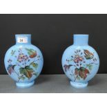 Pair of blue opaque glass vases painted with Autumn leaves and flowers, 27cm high, (2)