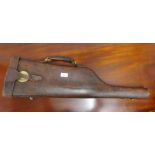 Leather mutton leg shaped gun case with brass mounts, 80cm long