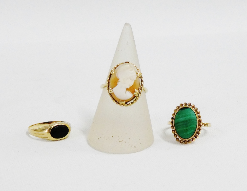 Three 9 carat gold rings to include a Cameo ring, etc (3)