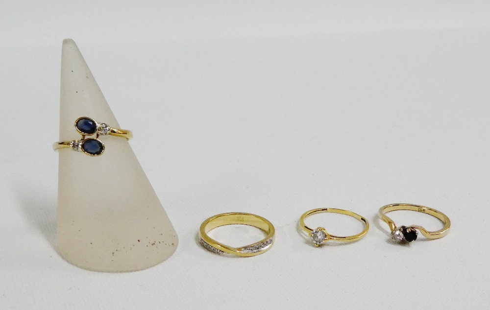 Three 9 carat gold diamond and gemset dress rings together with a yellow metal and paste set ring (