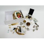 A carton containing costume jewellery, silver topped trinket jars, 1966 £5 note, etc (a lot)