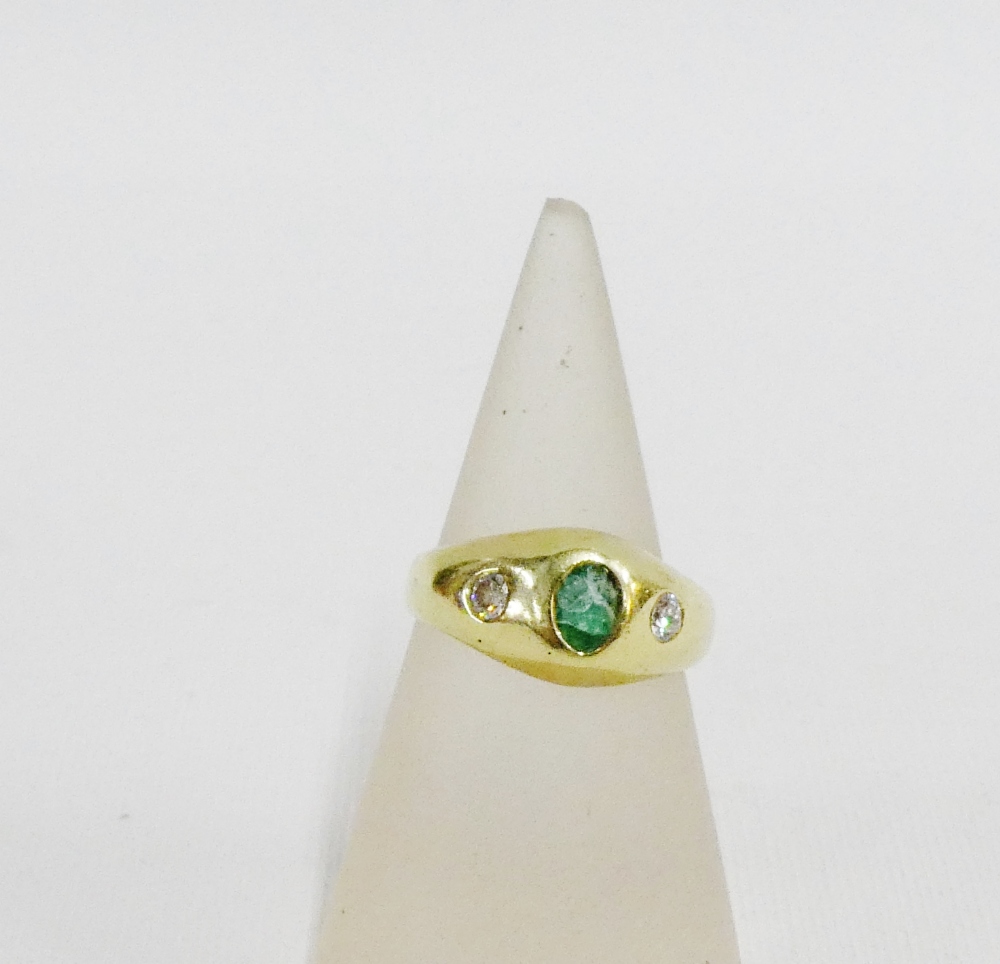 9 carat gold emerald and diamond three stone ring, UK ring size M