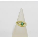 9 carat gold emerald and diamond three stone ring, UK ring size M