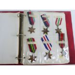 A Medal Album containing a quantity of 20th century medals and medallions to include WWI War,