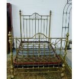 A brass bed, base 140 x 220cm, bed end 182cm high