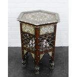 Moorish style inlaid table with hexagonal top over mother of pearl and fret work side panels, 70 x
