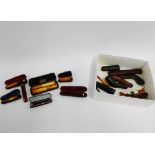 A large collection of 19th century and later cheroot and cigarette holders to include Bakelite and