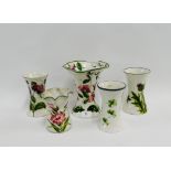 Collection of four Wemyss pottery vases, patterns to include Thistle, Iris, Cornflower and Shamrock,