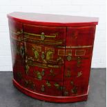 Red lacquered chinoiserie bow fronted cabinet with four central drawers flanked by cupboard doors,