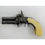 Small 19th century Continental percussion pocket pistol with ivory handle, overall length 15.5cm