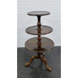 Mahogany three tier dumb waiter on tripod support, 113cm