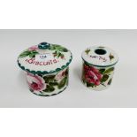 Wemyss 'Cabbage Rose' patterned hair tidy jar and cover, together with a biscuit jar and cover,