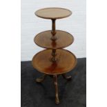 Mahogany three tier dumb waiter on tripod support, 111cm